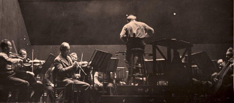 Rehearsal for the Mozart Oboe Quartet (arranged as a concerto for Tabuteau) with Eugene Ormandy conducting members of the Philadelphia Orchestra in October of 1939.