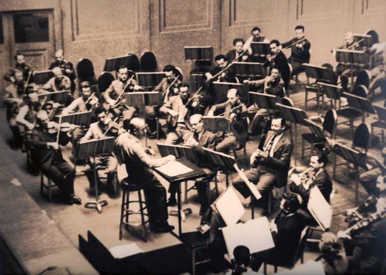Tabuteau with colleagues (l to r) Sol Schoenbach, bassoon; Mason Jones, horn; and Ralph McLane, clarinet; rehearsing the Mozart Sinfonia Concertante with Eugene Ormandy conducting members of the Philadelphia Orchestra in March of 1948.