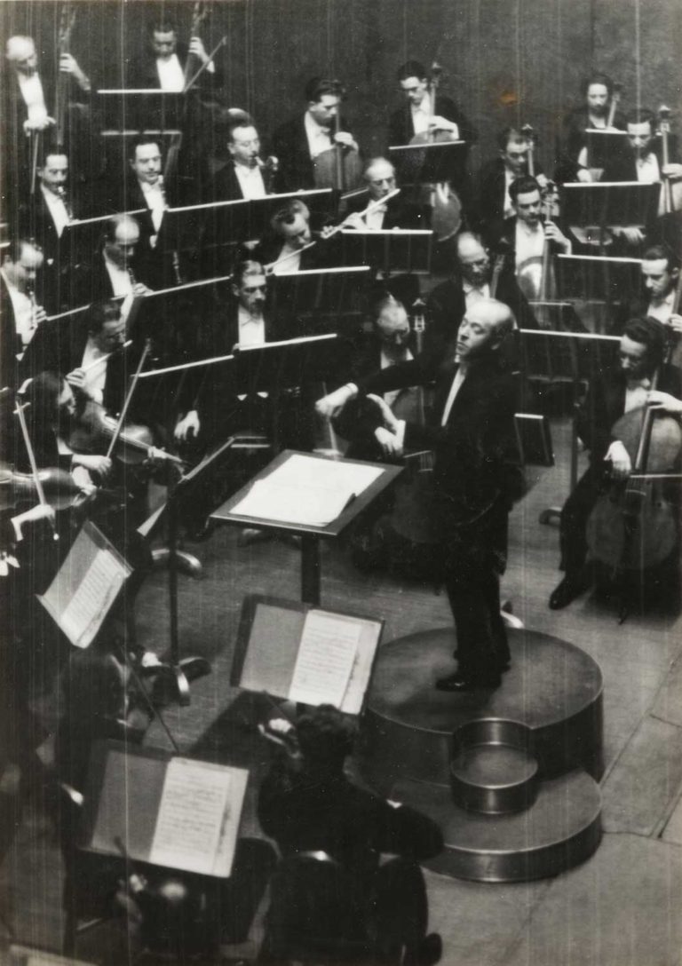 Eugene Ormandy conducting the Philadelphia Orchestra. The oboes are sitting to the right of the flutes.
